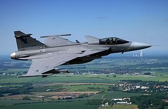 Air to air with a Czech Saab Gripen with AFB Caslav in the background SAAB JAS F39-E Gripen